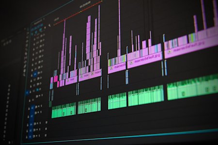A close up of a computer monitor displaying video editing software.