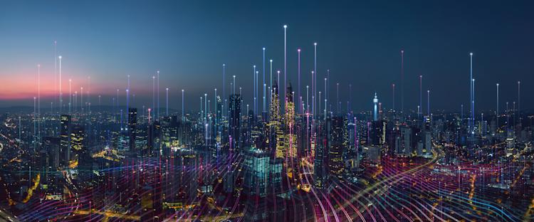 City skyline with a graphical overlay that represents interconnected networks