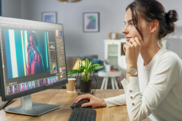 Woman using  Splashtop Personal to edit creative files 