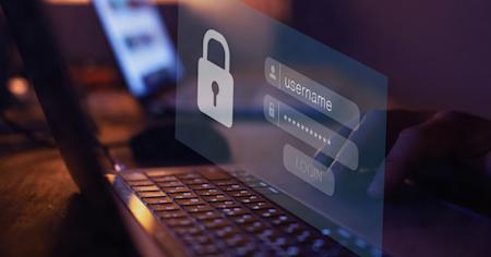 Secure login authentication on a laptop screen, representing Privileged Access Management (PAM) for enhanced cybersecurity.