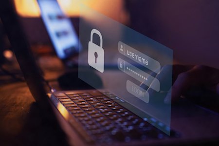 Secure login authentication on a laptop screen, representing Privileged Access Management (PAM) for enhanced cybersecurity.