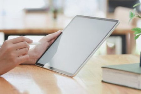 Reading about HIPAA-compliant remote desktop on a tablet