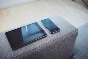 An iPad and an iPhone, connected via remote access software from Splashtop.