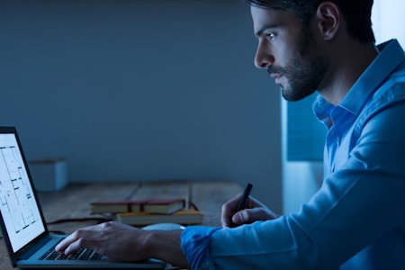 A man working from home by remotely access his work computer with Splashtop to run Revit