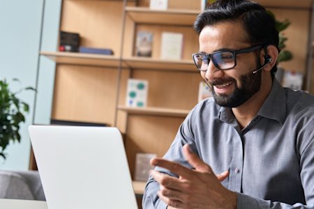 Male IT professional studying remote desktop solutions on a computer screen