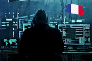 A French hacker in front of his computer.