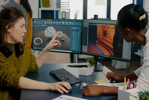 Two video game developers working remotely by leveraging Splashtop