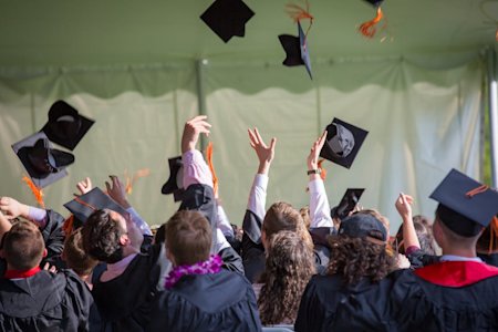 Students celebrating graduation.
