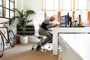 A man using a Wacom device with Splashtop to work remotely