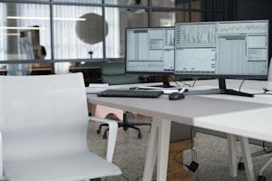 Desktop computers in an office.