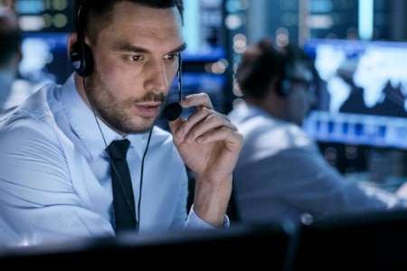 IT helpdesk technician troubleshooting a computer issue using Splashtop Enterprise remote support tools