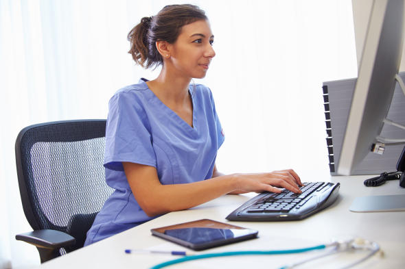 A nurse using Splashtop's remote access software to look at a patient's records.