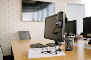 Windows computers in a meeting room.