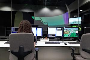 A person working on a computer at a desk.