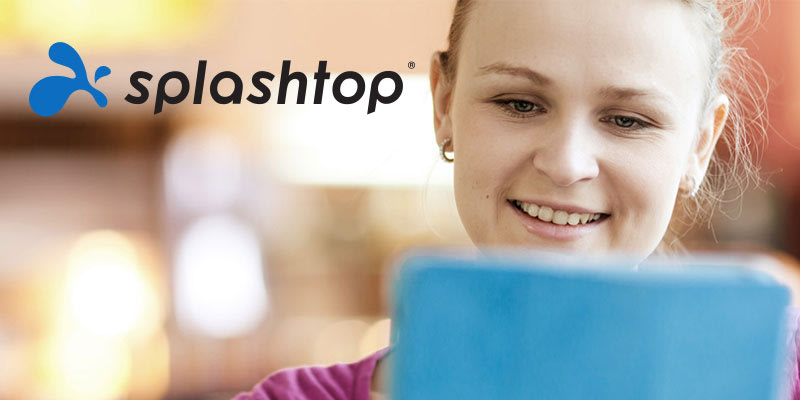 A smiling person looks at a blue tablet, with the Splashtop logo displayed in the upper left corner of the image. The background is softly blurred.