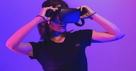 A woman wearing a VR headset.