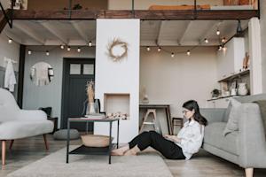 A woman working from here home using a laptop.
