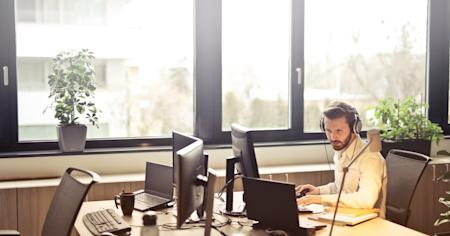 An IT manager working at his computer.
