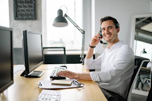 An IT support technician remotely troubleshooting an end-user's device.