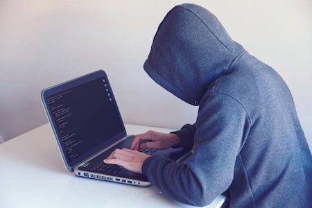 A person using a computer.