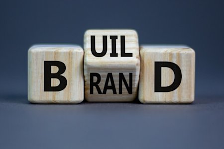 Words Build Brand formed with wooden blocks