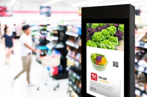 Large touchscreen device in grocery store using wireless screen mirroring technology