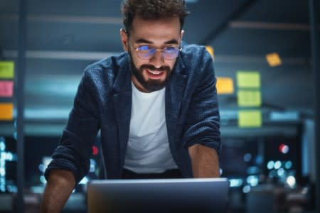 IT technician reading an article on fast and secure IT remote support control software