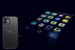 An Android phone and an iPhone, connected via remote access software.