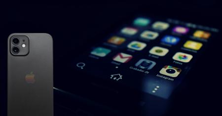 An Android phone and an iPhone, connected via remote access software.