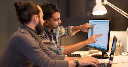 Two members of an internal IT team using Splashtop's remote access tools.