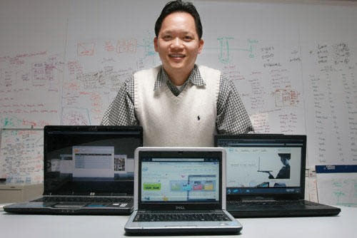 Mark Lee, Splashtop founder, with laptops running Splashtop software
