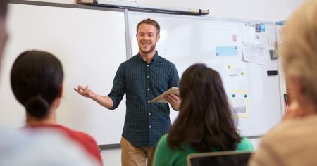 Teacher in classroom demonstrating Splashtop and how it works