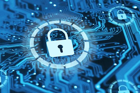 Security padlock placed on top of a circuit board