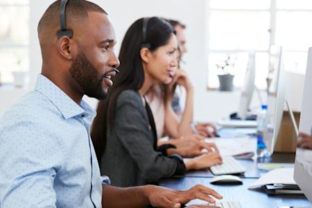 IT support helping via desktop with remote access software