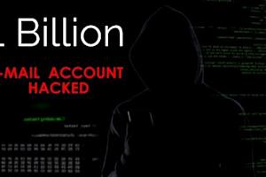 Silhouette of a hacker with text '1 Billion E-Mail Account Hacked' highlighting cyber security risks