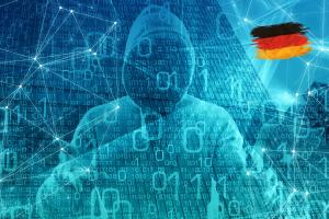 A cybercriminal in Germany in front of binary code and network connections.