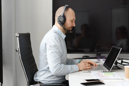 A tech support agent working