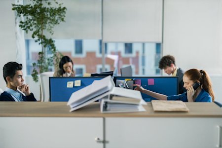 Four coworkers working in an office.