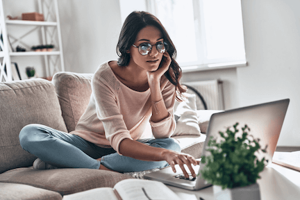 Focused woman working from home on her laptop using Splashtop for remote work