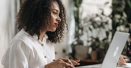A business person working on their laptop.