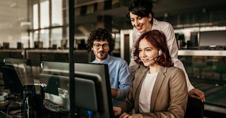An IT support team attending a client remotely.