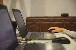 A person typing at their workstation.