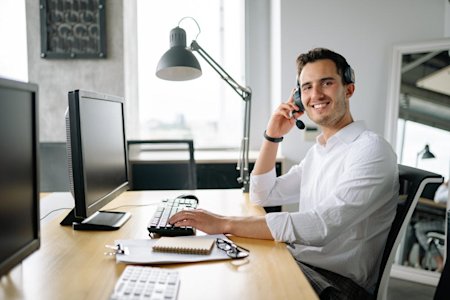 An IT support agent at his workstation.