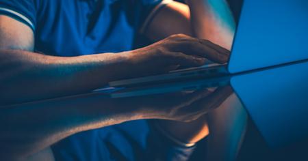 A man using desktop as a service (DaaS) for remote work.