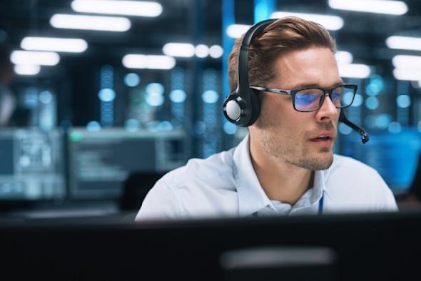 Man studying security measures for remote access software